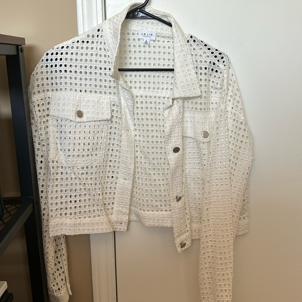White jacket with holes from Buckle.